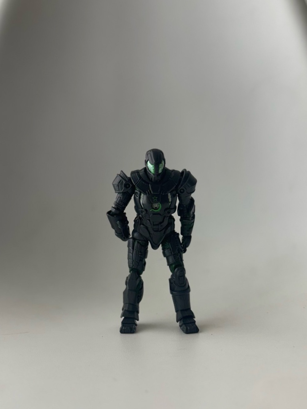 Hasbro Black and Green Armored Action Figure